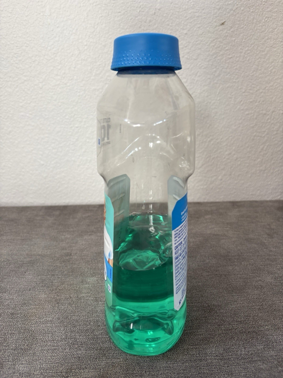Mr. Clean Multipurpose Cleaner with Febreze, Meadows & Rain 44oz Bottle 40% Full