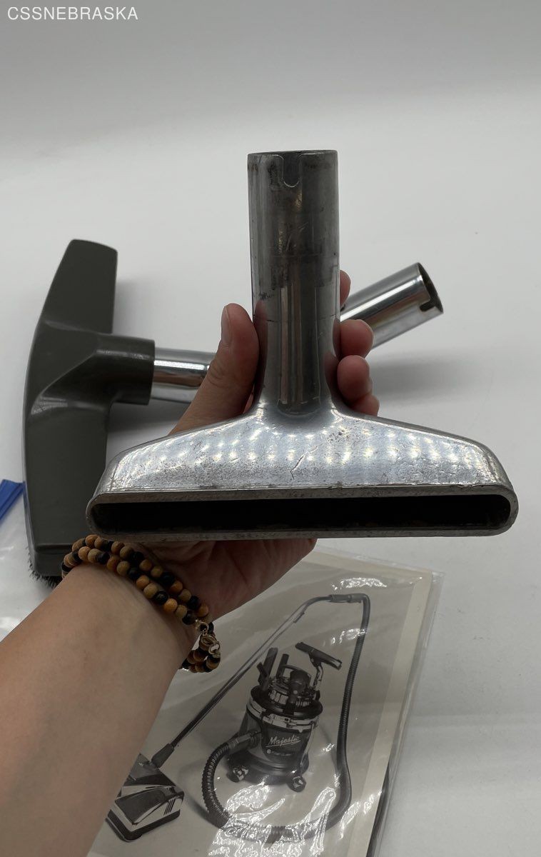 Silver Filter Queen generic floor brush with two attachments,instruction manual.