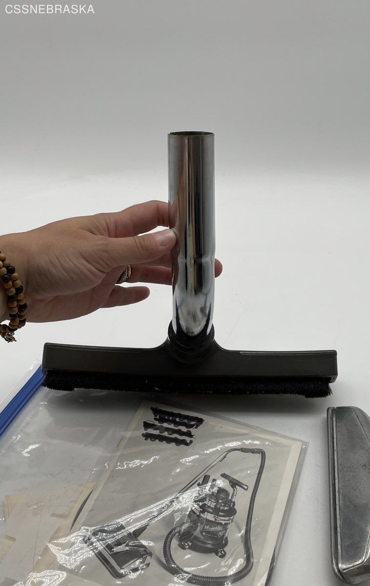 Silver Filter Queen generic floor brush with two attachments,instruction manual.