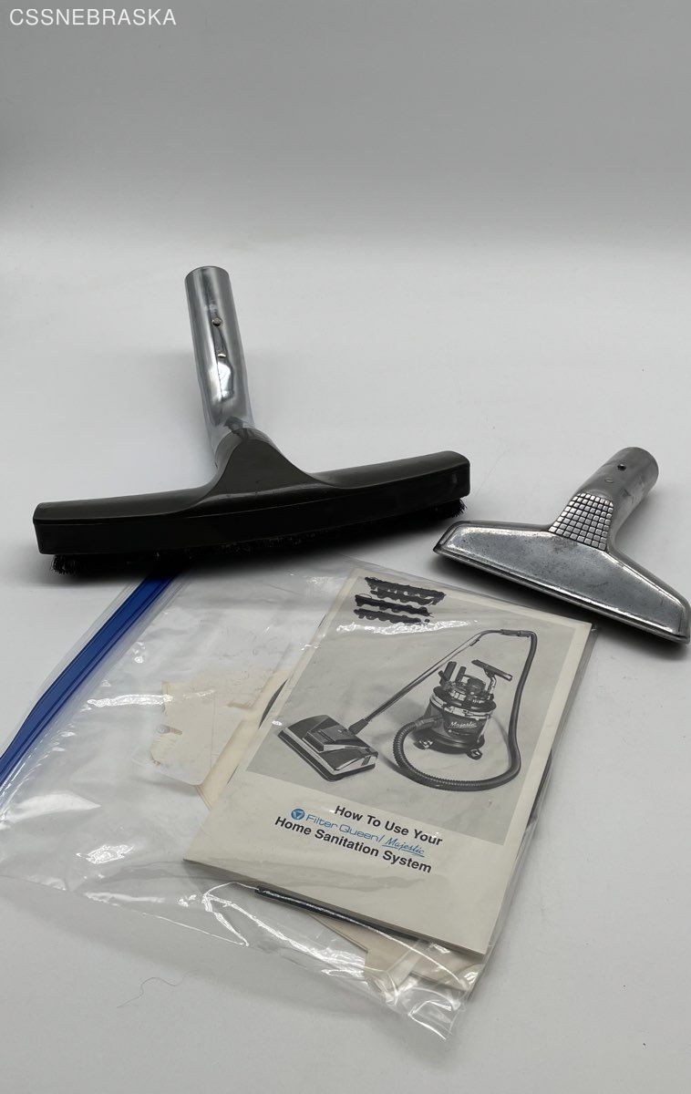 Silver Filter Queen generic floor brush with two attachments,instruction manual.