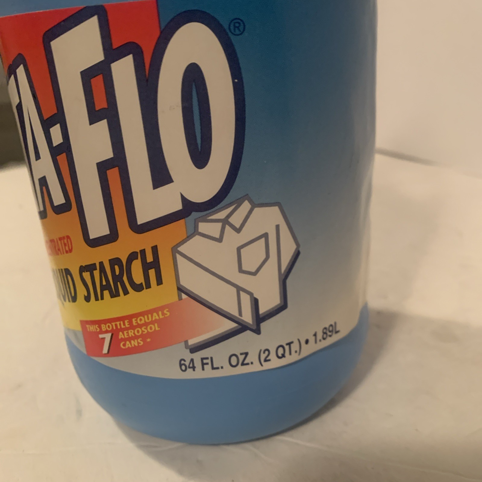 Sta-Flo Liquid Starch 64 Oz Discontinued Blue Container 90% Full