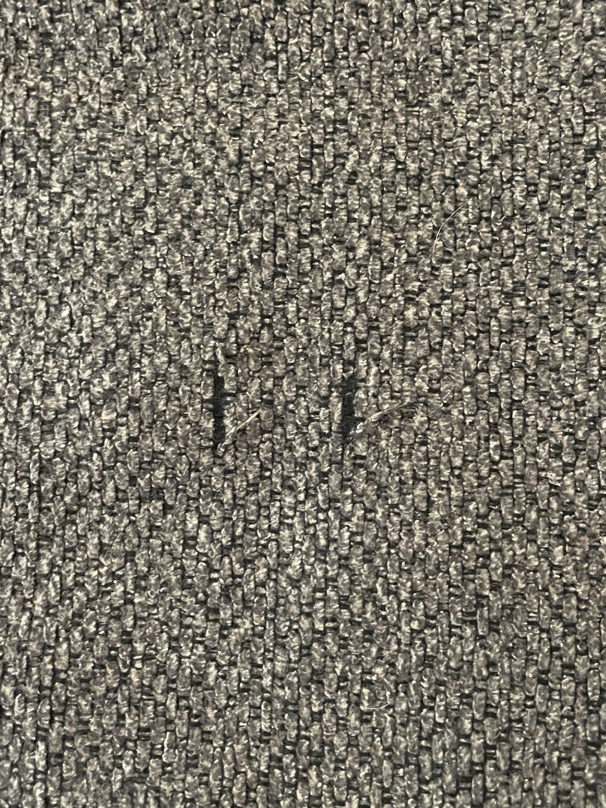Jordan’s Couch-2 years old. Small stitch issue on ottoman(in pic).