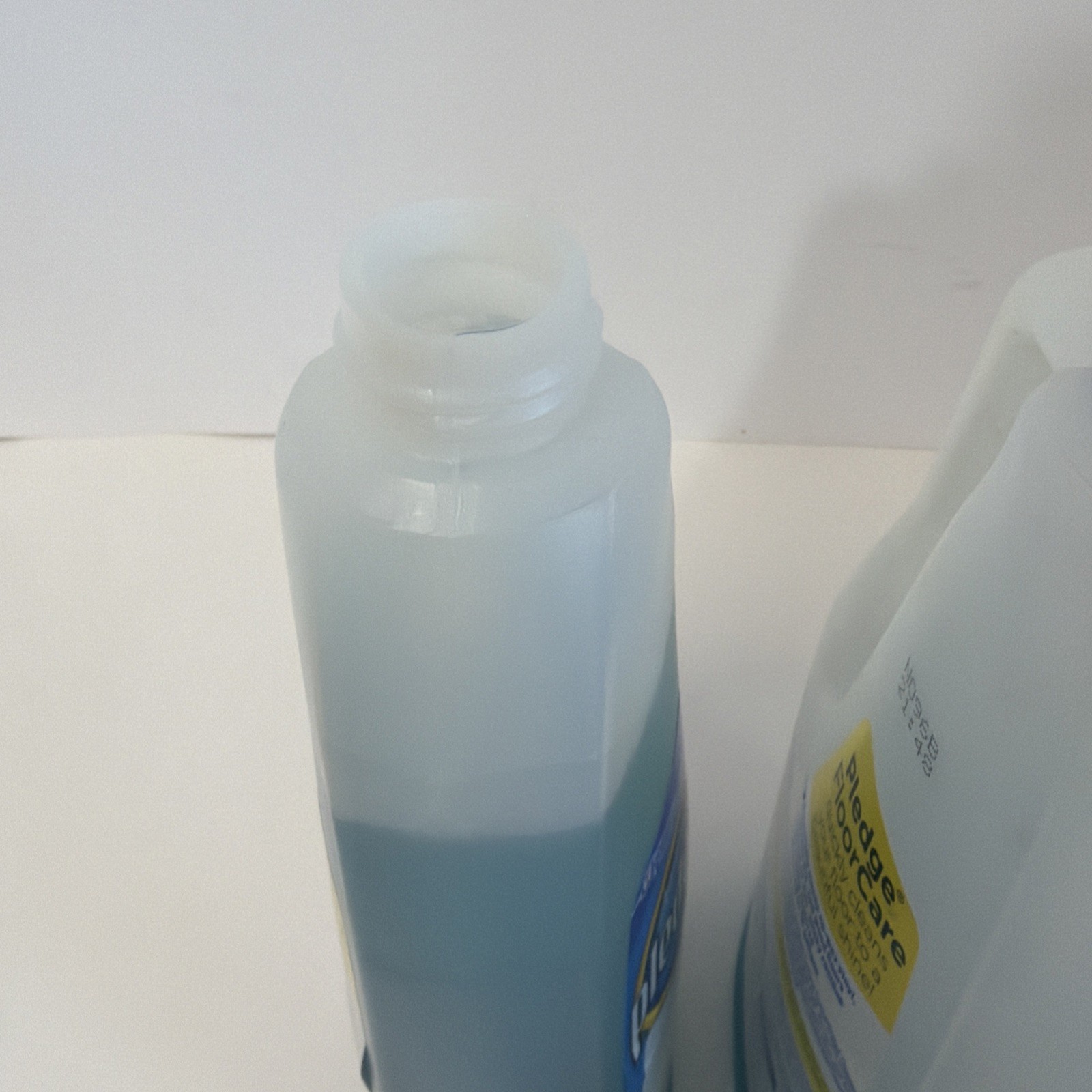 Pledge Floor Care Concentrate Multi-Surface Cleaner with Glade Rainshower 32 OZ