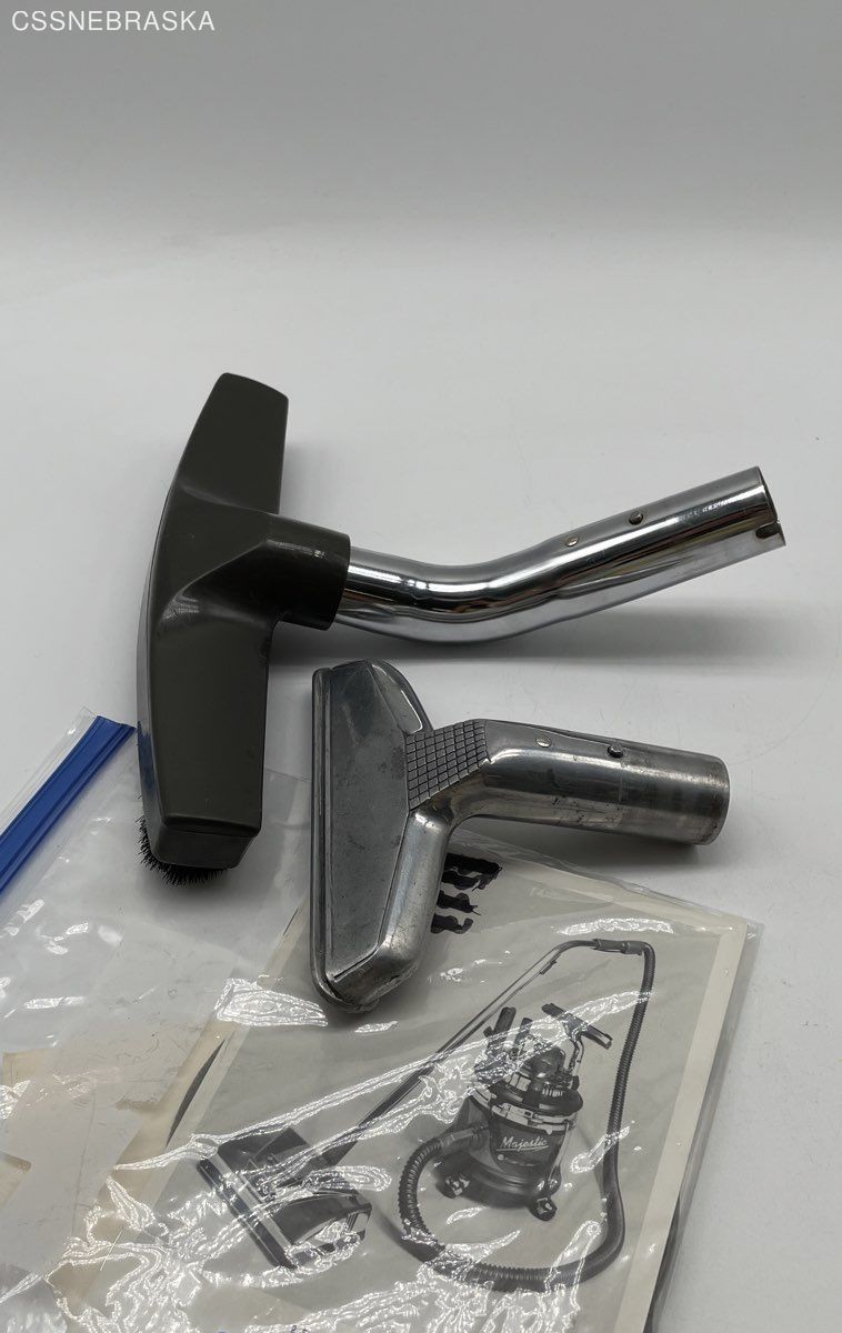 Silver Filter Queen generic floor brush with two attachments,instruction manual.