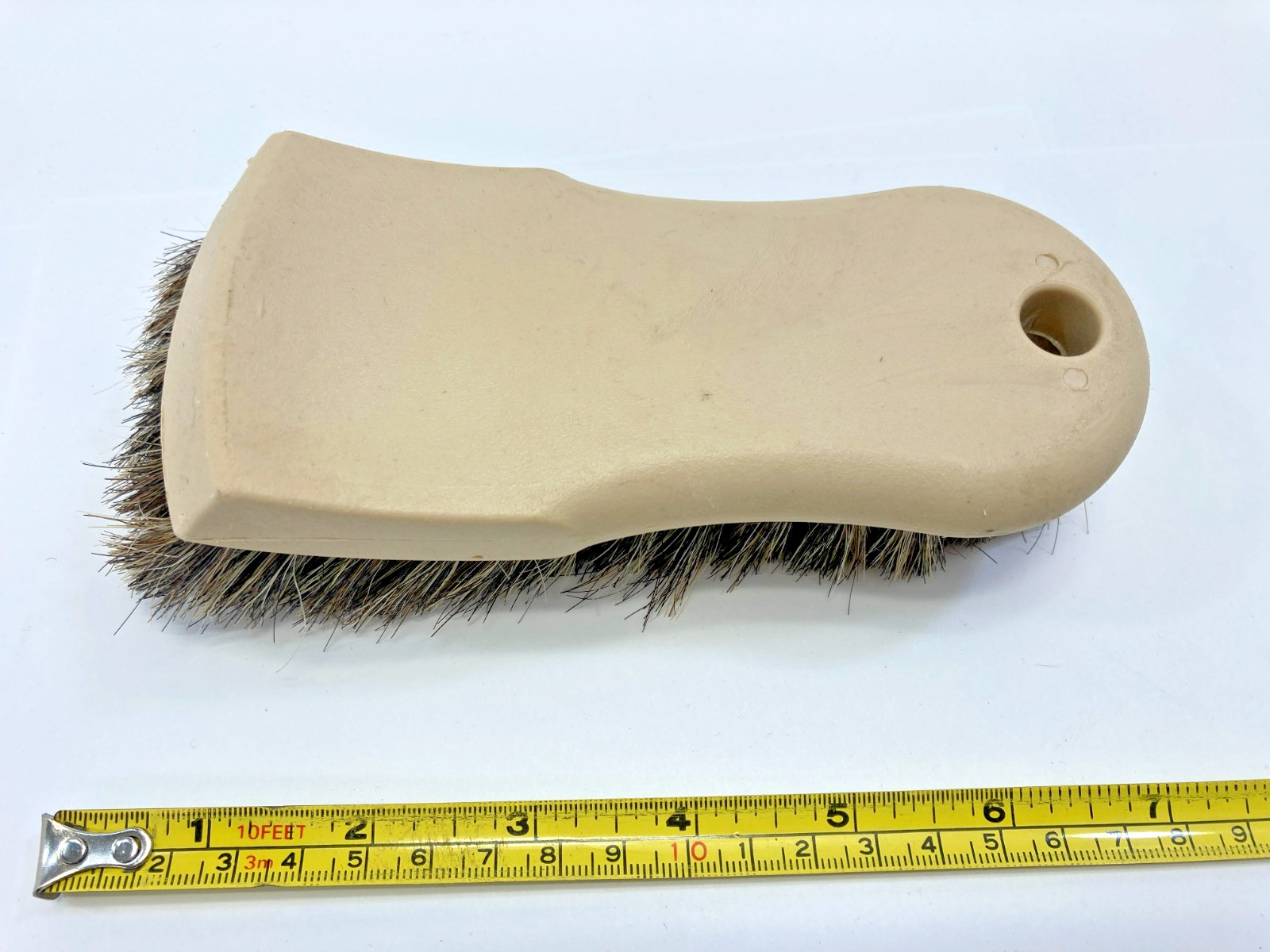 Hand Held Palm Size Scrub Brush.