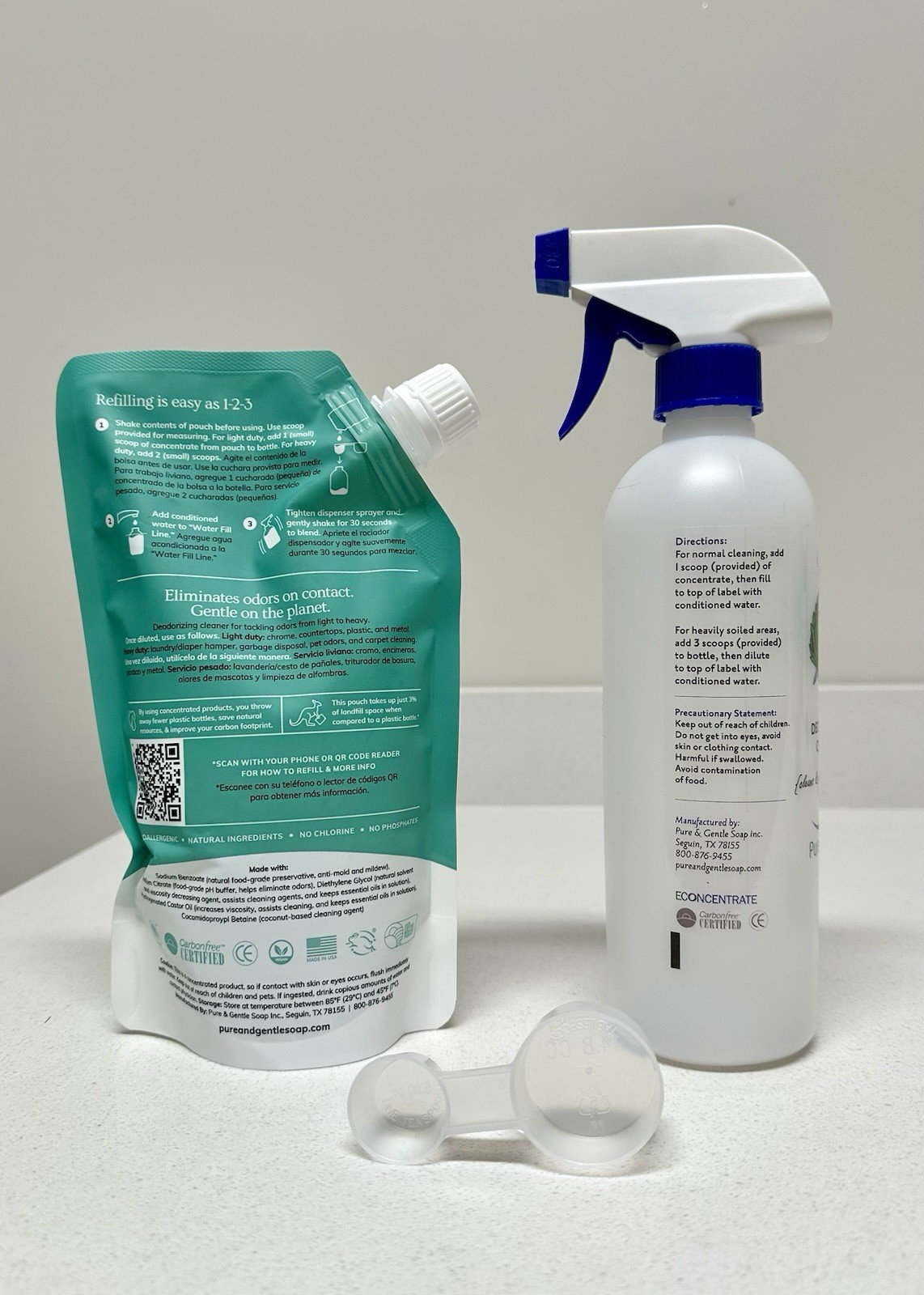Pure & Gentle Deodorizer Cleaner Concentrate 16oz & spray bottle, and scoop.