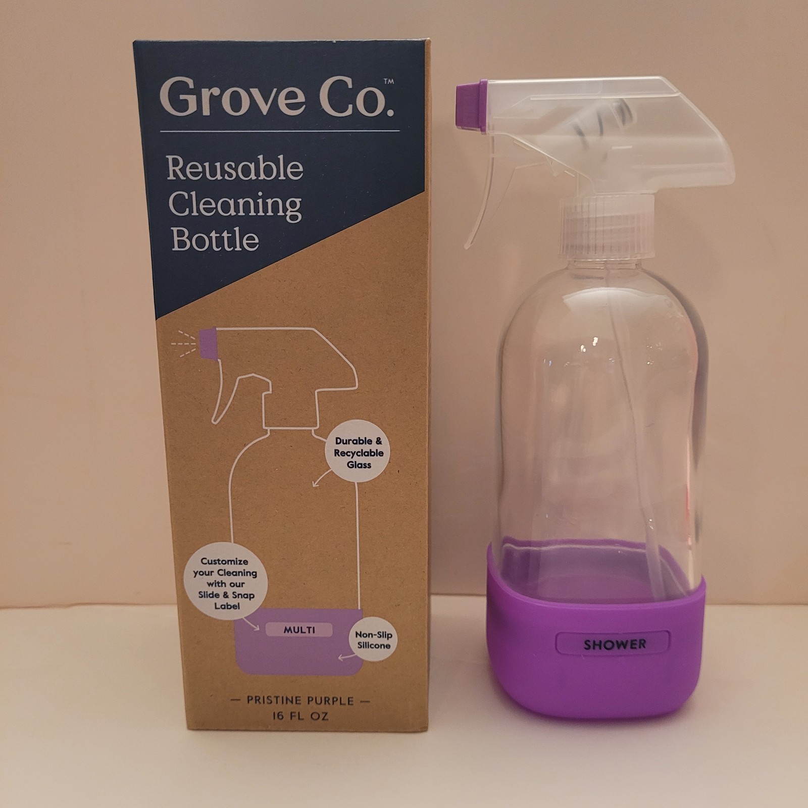 Grove Co. Glass Spray Bottle 16 Oz Purple Silicone Sleeve Multi Purpose