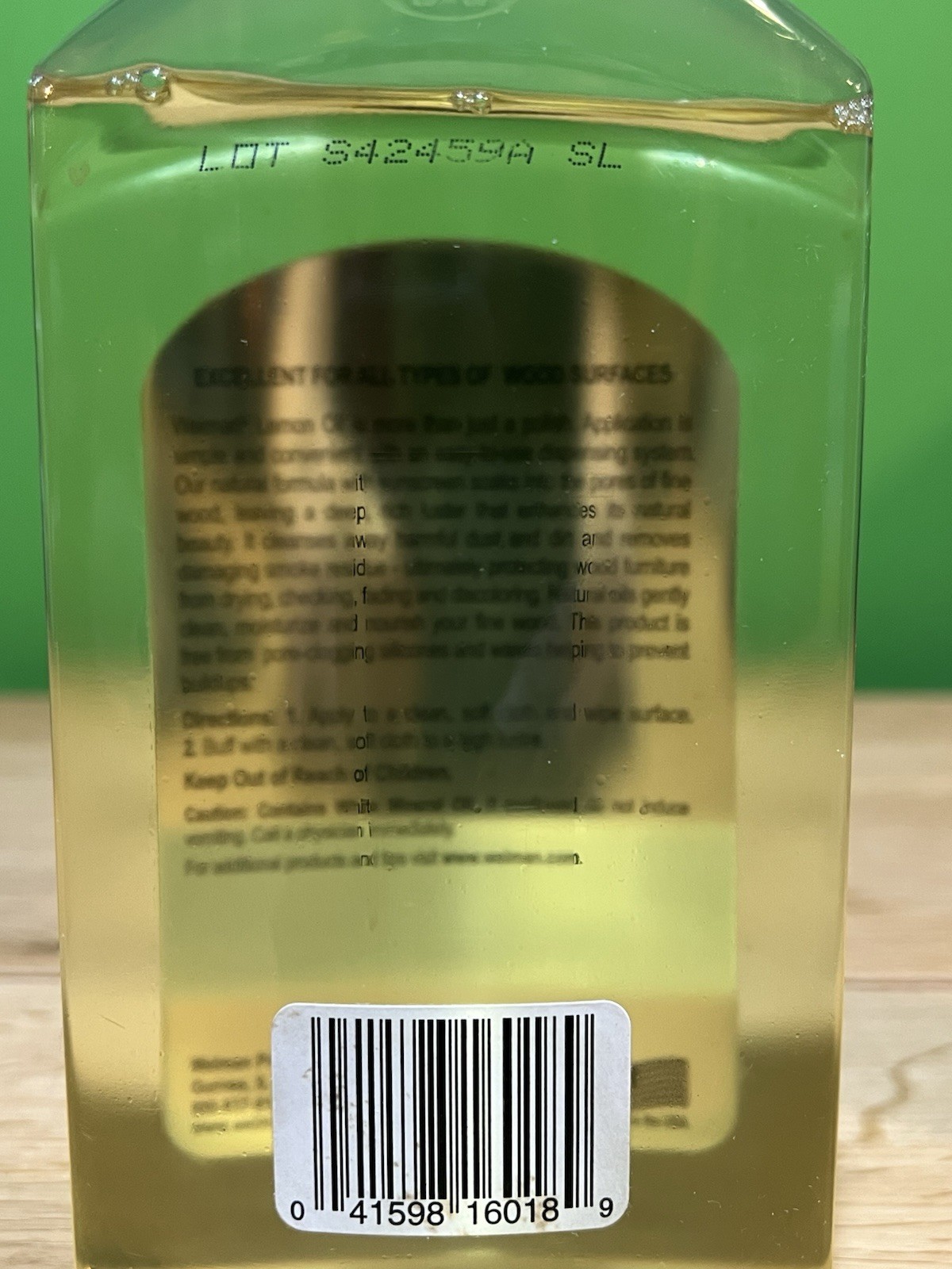 Weiman Natural Lemon Oil Furniture Wood Polish with Sunscreen 16 Oz Open Bottle