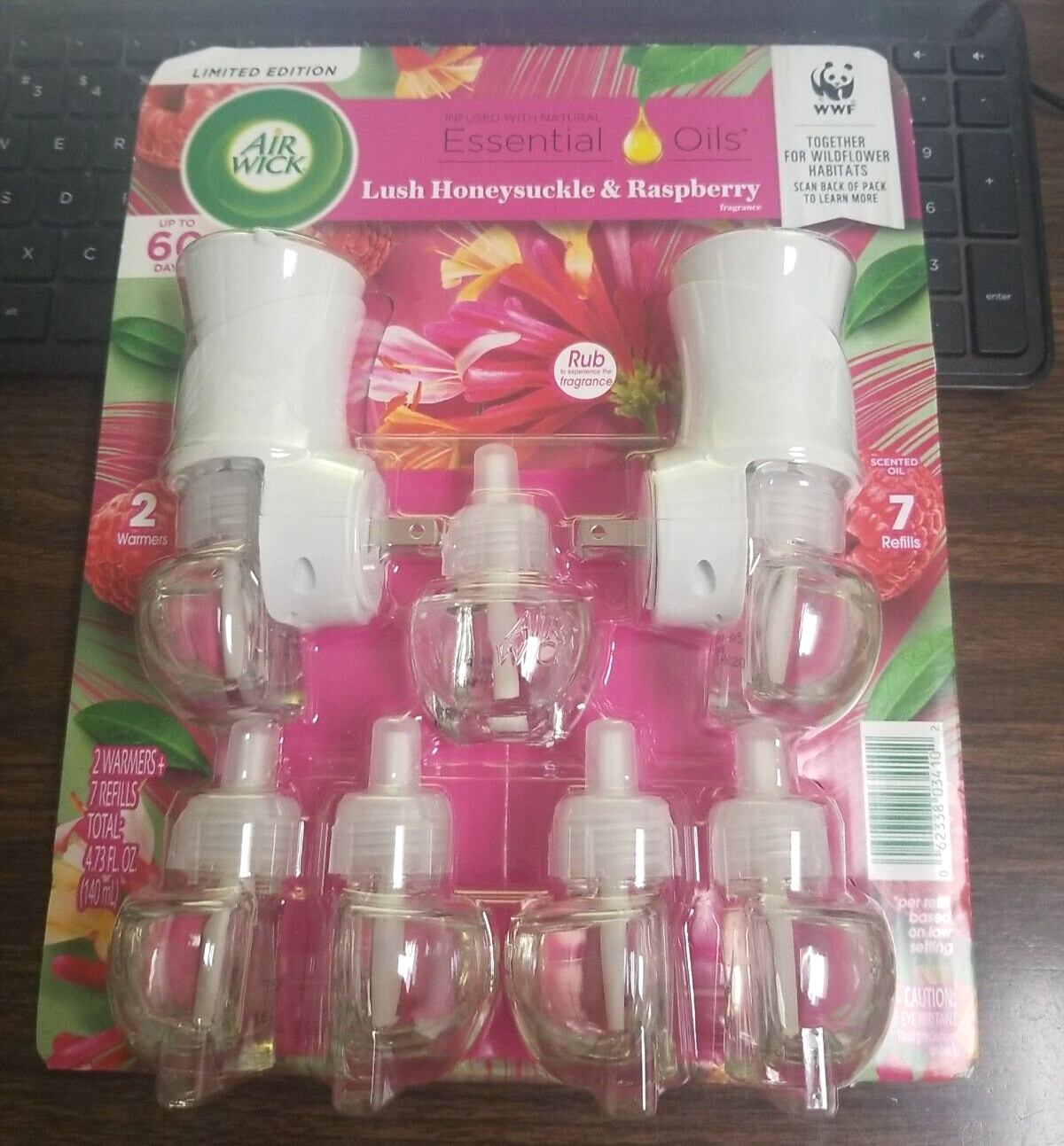 AIRWICK HONEYSUCKLE SCENTED PLUG-IN, UP TO 60 DAYS(7-0.67 oz REFILLS & 2 WARMER)