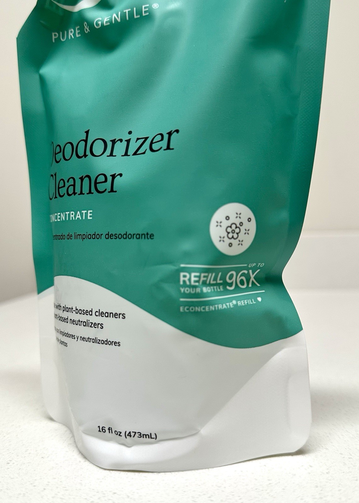 Pure & Gentle Deodorizer Cleaner Concentrate 16oz & spray bottle, and scoop.