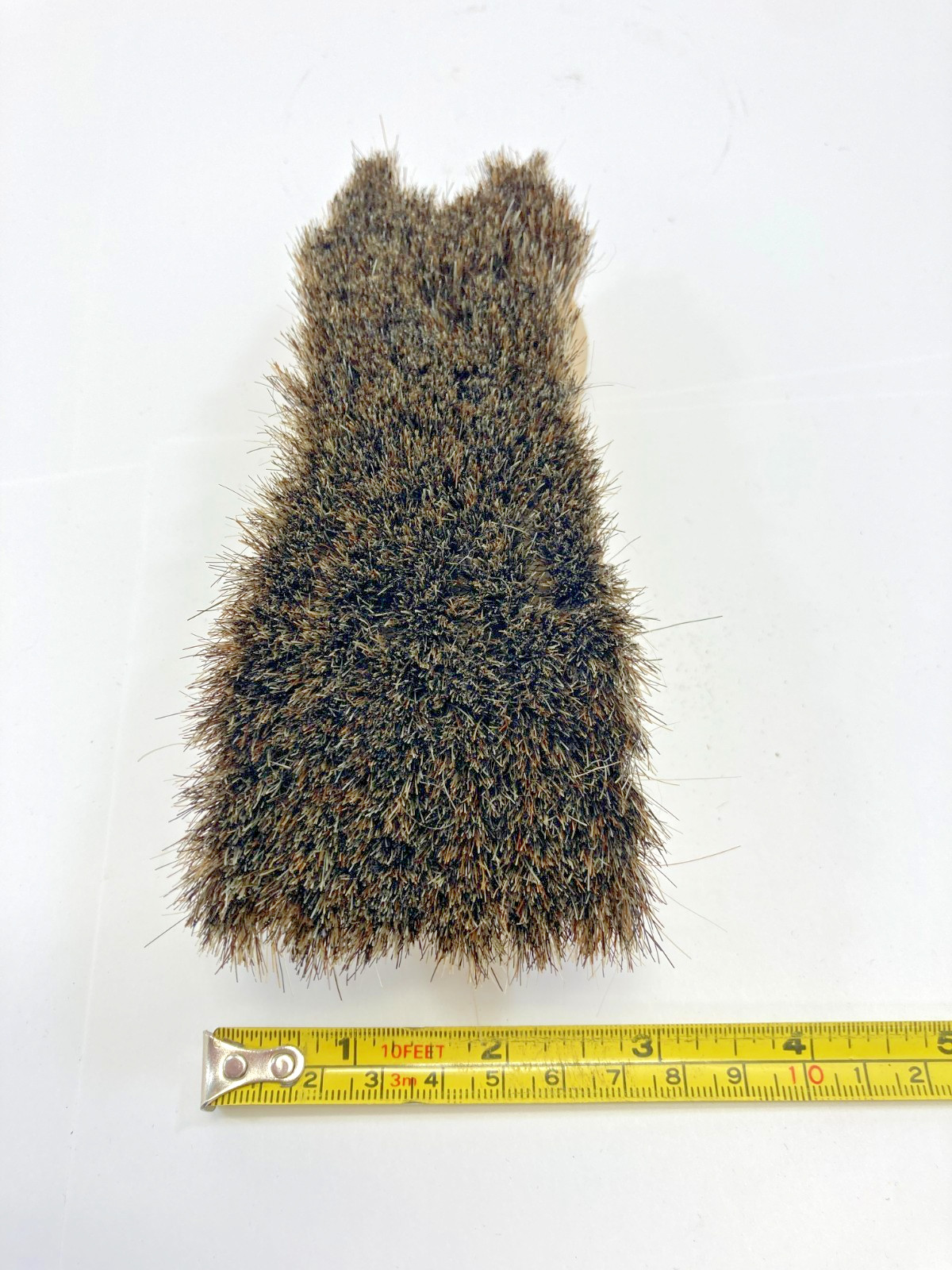 Hand Held Palm Size Scrub Brush.