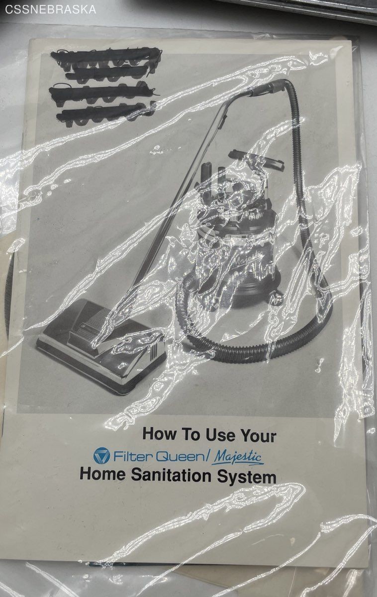 Silver Filter Queen generic floor brush with two attachments,instruction manual.
