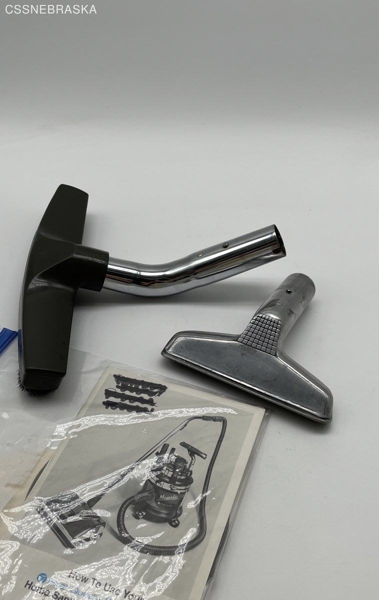 Silver Filter Queen generic floor brush with two attachments,instruction manual.