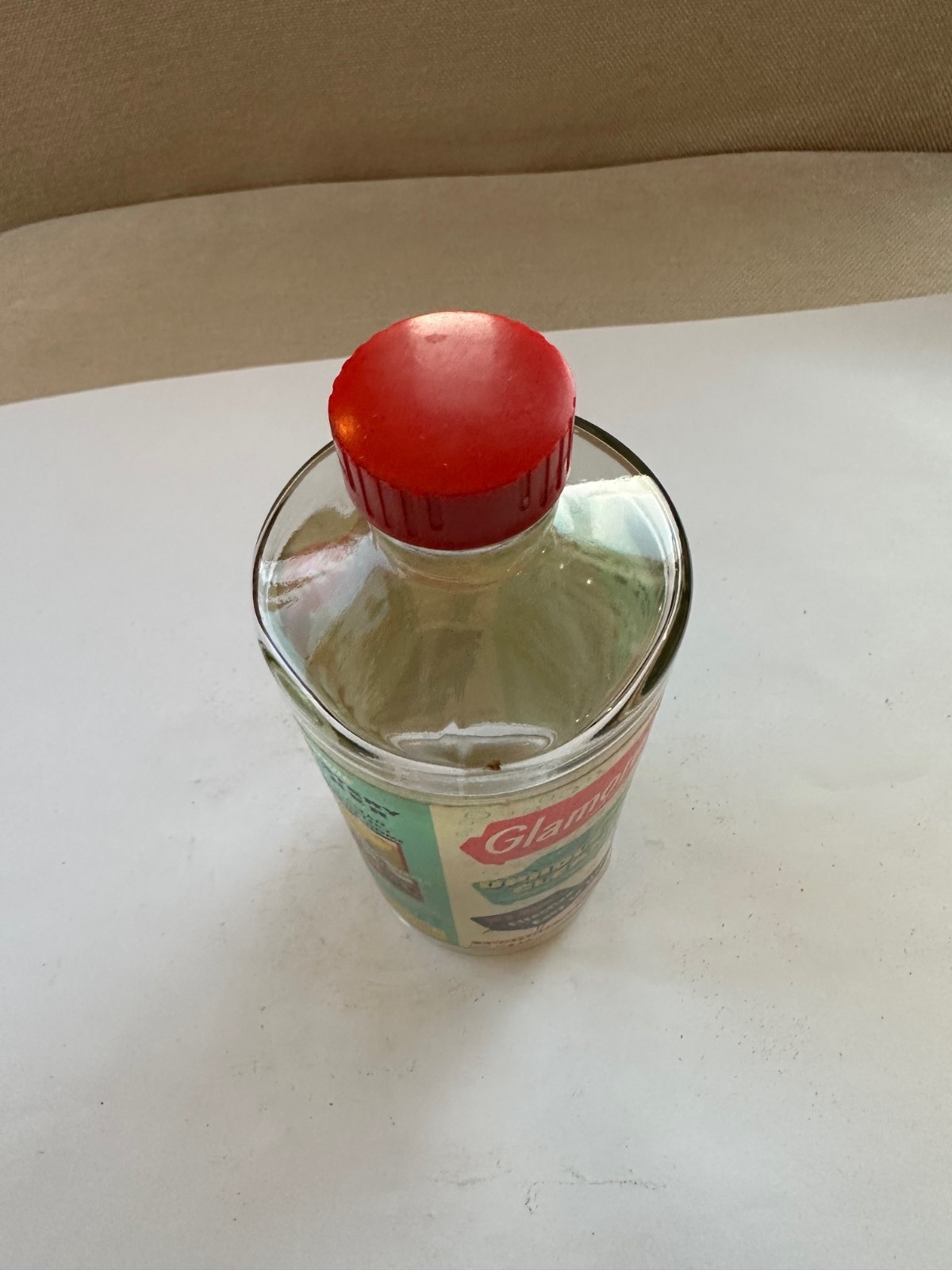 Vintage Glamorene Upholstery Cleaner One Pint Bottle With Lid. No contents.