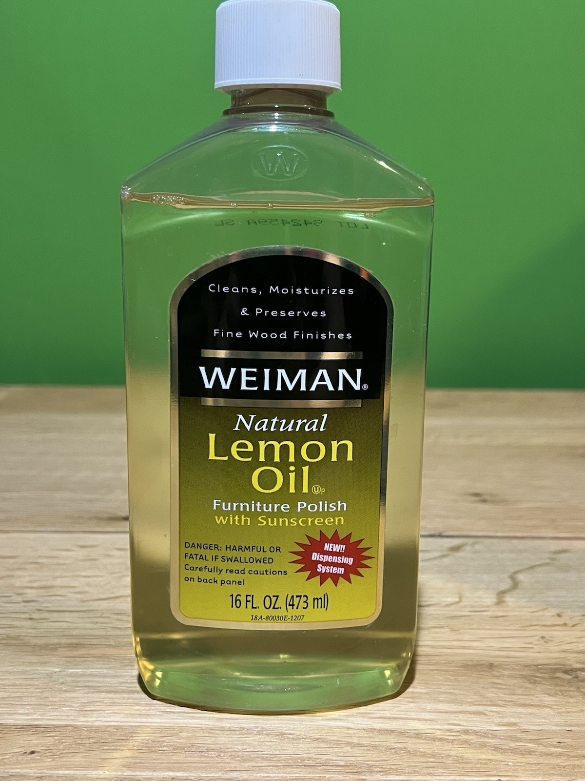 Weiman Natural Lemon Oil Furniture Wood Polish with Sunscreen 16 Oz Open Bottle