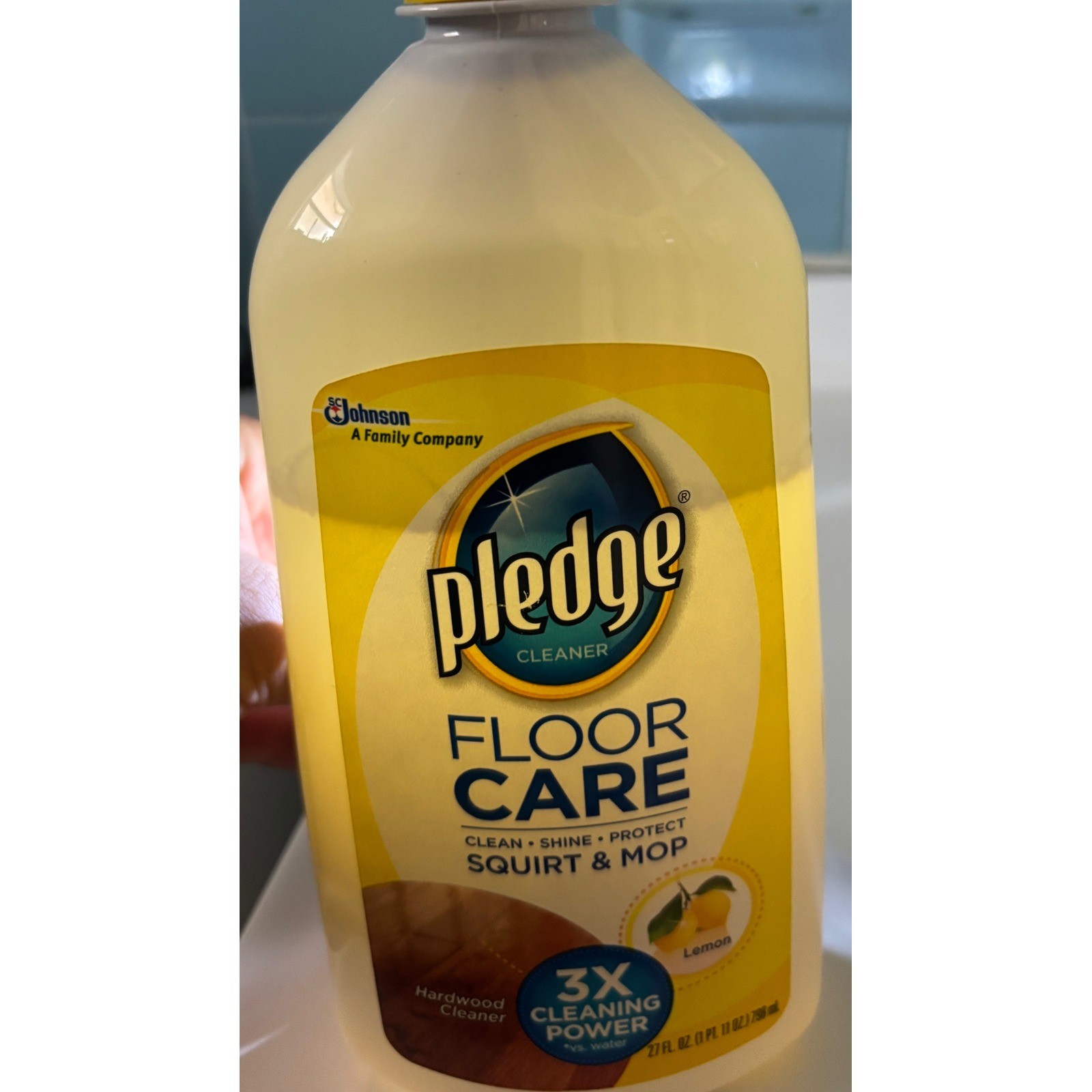 Pledge FloorCare Wood Squirt & Mop Hardwood Cleaner Lemon 27 oz Bottle 70% full