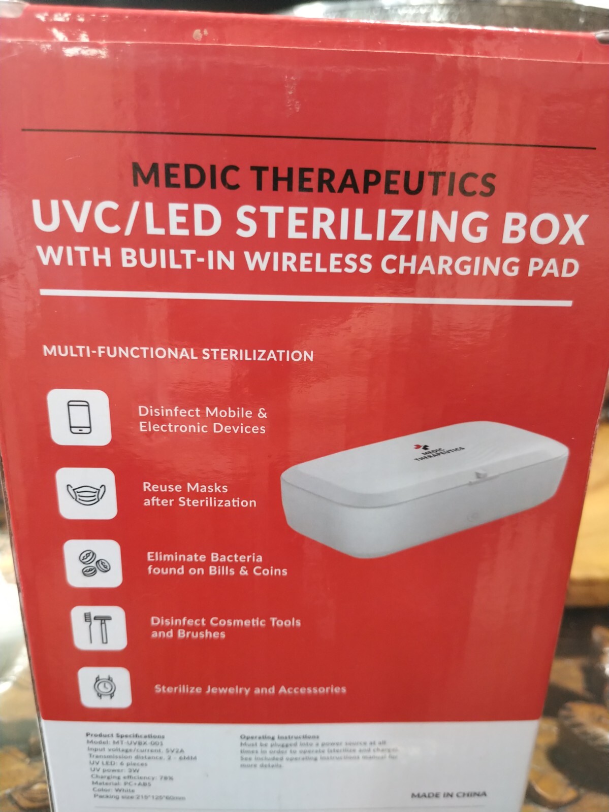 UVC LED sterilizing box with built-in wireless charging pad. NEW, UNUSED.
